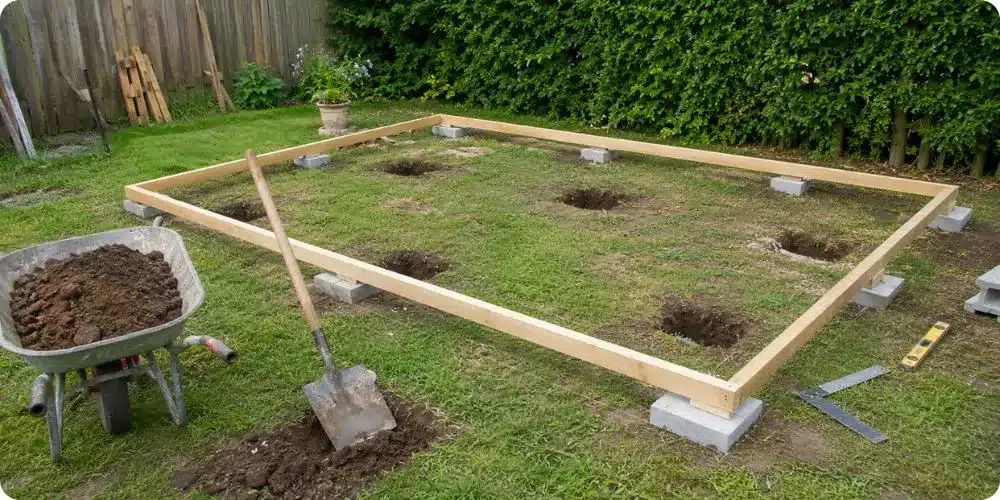 Fondations plots béton pour cabane en palette